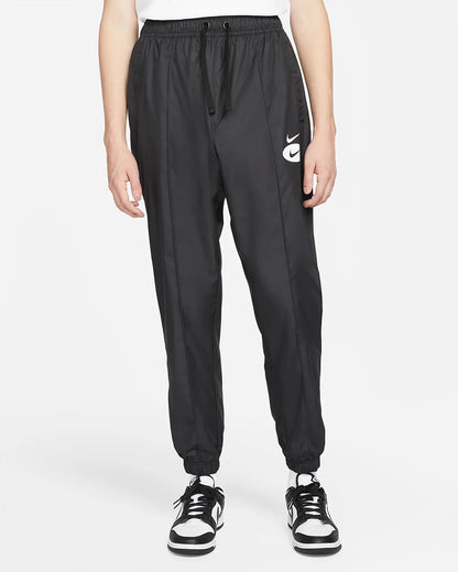Nike Pantaloni in tessuto con fodera Nike Sportswear Swoosh League